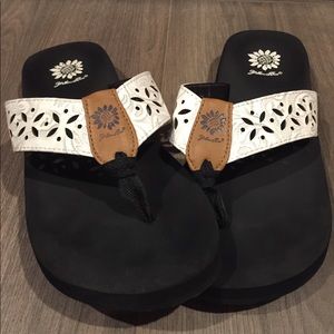 Yellow box flip flops